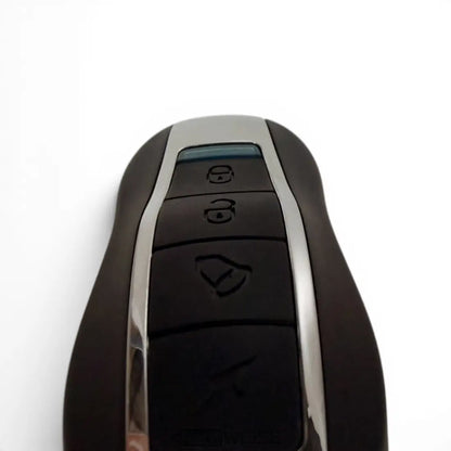 Schwarzer und silberner porsche hoverboard fernbedienung schlüsselanhänger mit vier tasten und geschwungenem design